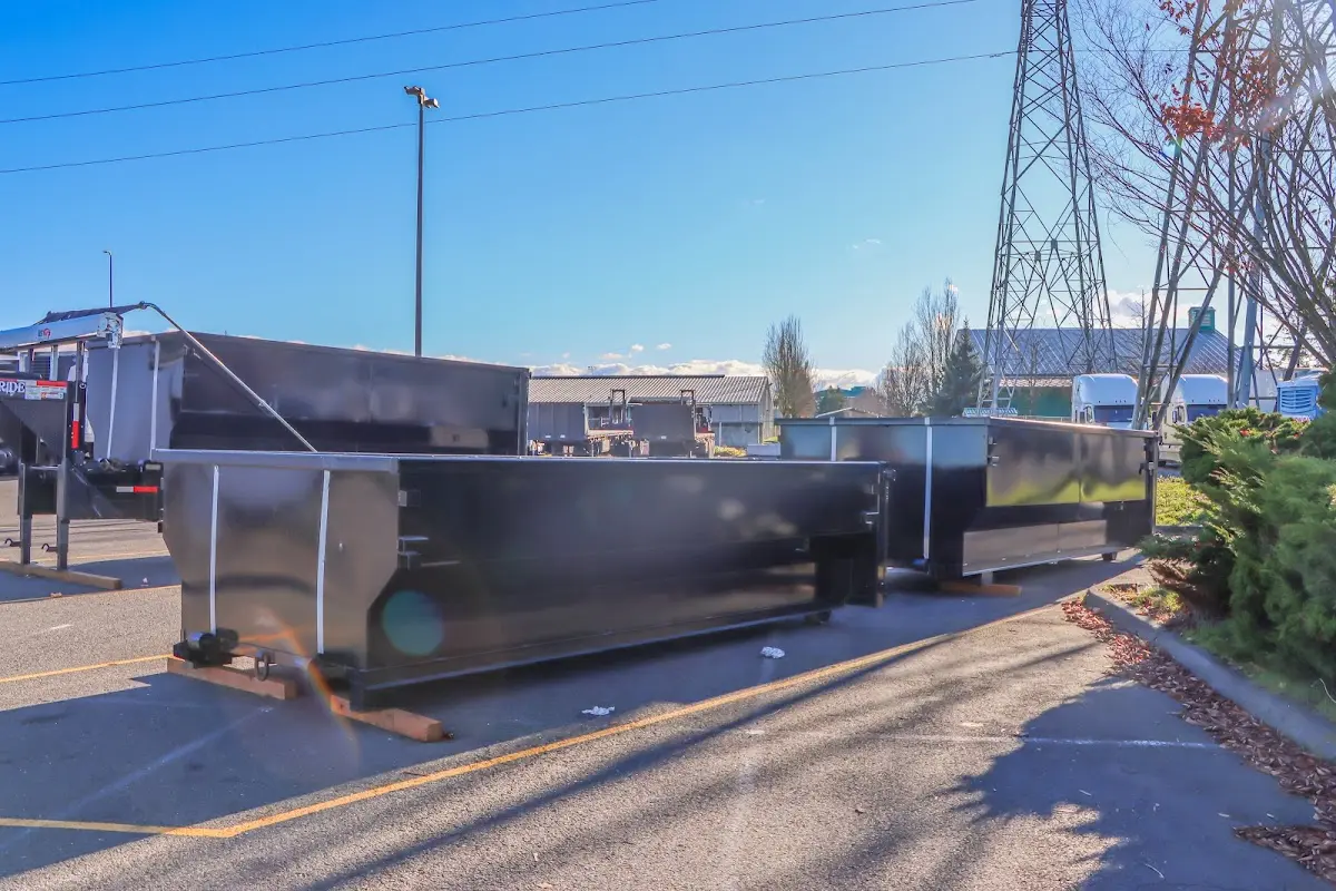 Roll-off dumpster ready for waste disposal at job site for 3 Yard Dumpster Rental in Elko New Market